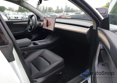 2023 Tesla Model Y Awd/Long Range Dual Motor All-Wheel Drive from USA, damaged, VIN 7SAYGAEE6PF744113